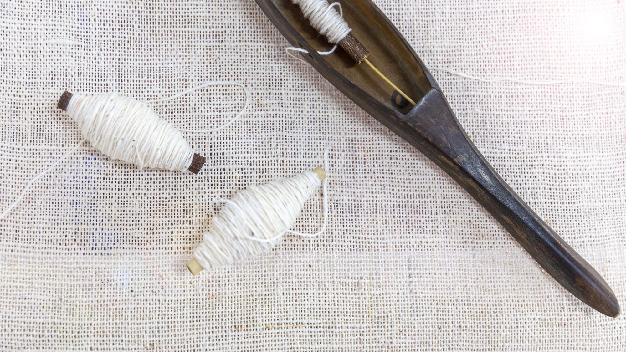 detailed embroidery on linen with scissors and thread